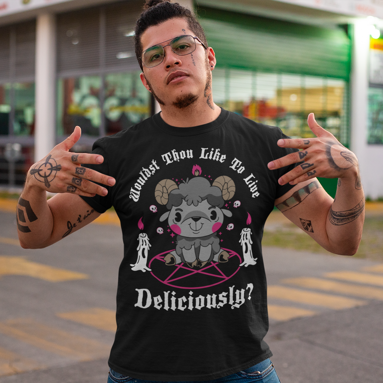 Unleash your inner rebel with this striking graphic tee featuring a smug, mystical goat perched atop a pentagram—summoning vibes as bold as your wardrobe. Inspired by folklore and a hint of witchy sarcasm, the chilling phrase "WOULDST THOU LIKE TO LIVE DELICIOUSLY?" is scrawled across the design in eerie, arcane lettering. Perfect for fans of the occult, dark humor, and aesthetic rebellion.