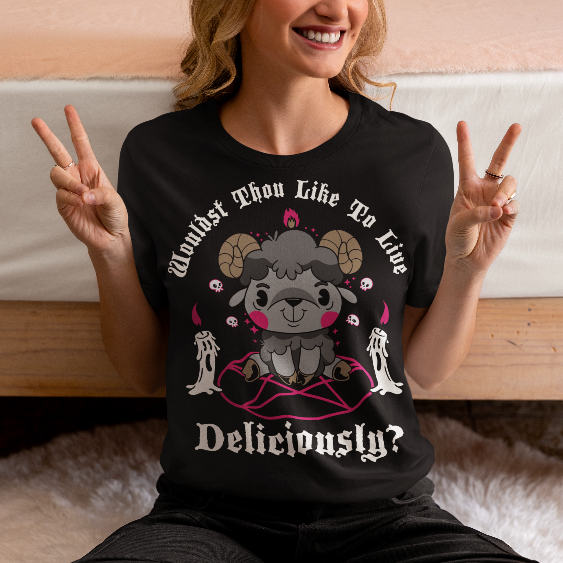 Unleash your inner rebel with this striking graphic tee featuring a smug, mystical goat perched atop a pentagram—summoning vibes as bold as your wardrobe. Inspired by folklore and a hint of witchy sarcasm, the chilling phrase "WOULDST THOU LIKE TO LIVE DELICIOUSLY?" is scrawled across the design in eerie, arcane lettering. Perfect for fans of the occult, dark humor, and aesthetic rebellion.