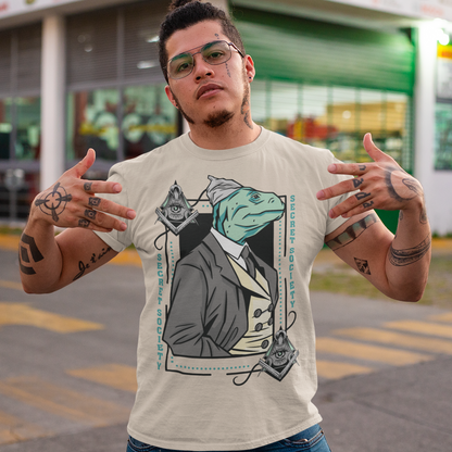 Introducing the enigmatic and captivating "Lizard Illuminati" T-shirt, a bold and eccentric garment that seamlessly blends conspiracy theories with reptilian sophistication. This one-of-a-kind tee is not just a piece of clothing; it's a statement, a conversation starter, and a whimsical nod to the mysteries that lurk in the shadows.