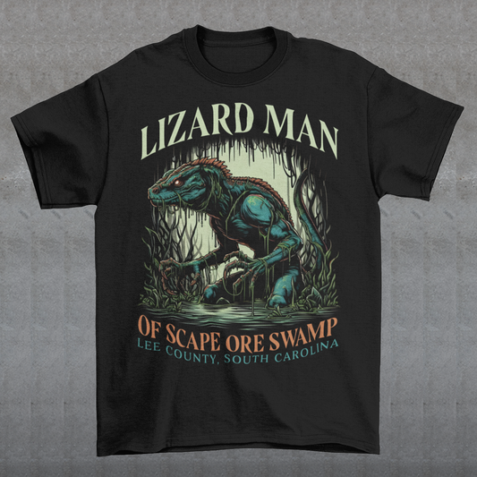 This t-shirt features a striking design of the legendary "Lizard Man of Scape Ore Swamp." The centerpiece is a menacing yet intriguing lizard man emerging from the murky depths of a swamp, with reptilian scales glistening under the eerie moonlight. The creature's glowing yellow eyes peer out from beneath a rugged brow, and its powerful claws grasp at the twisted roots and moss that surround it. Perfect for fans of cryptozoology, folklore, or anyone who loves a good monster tale!