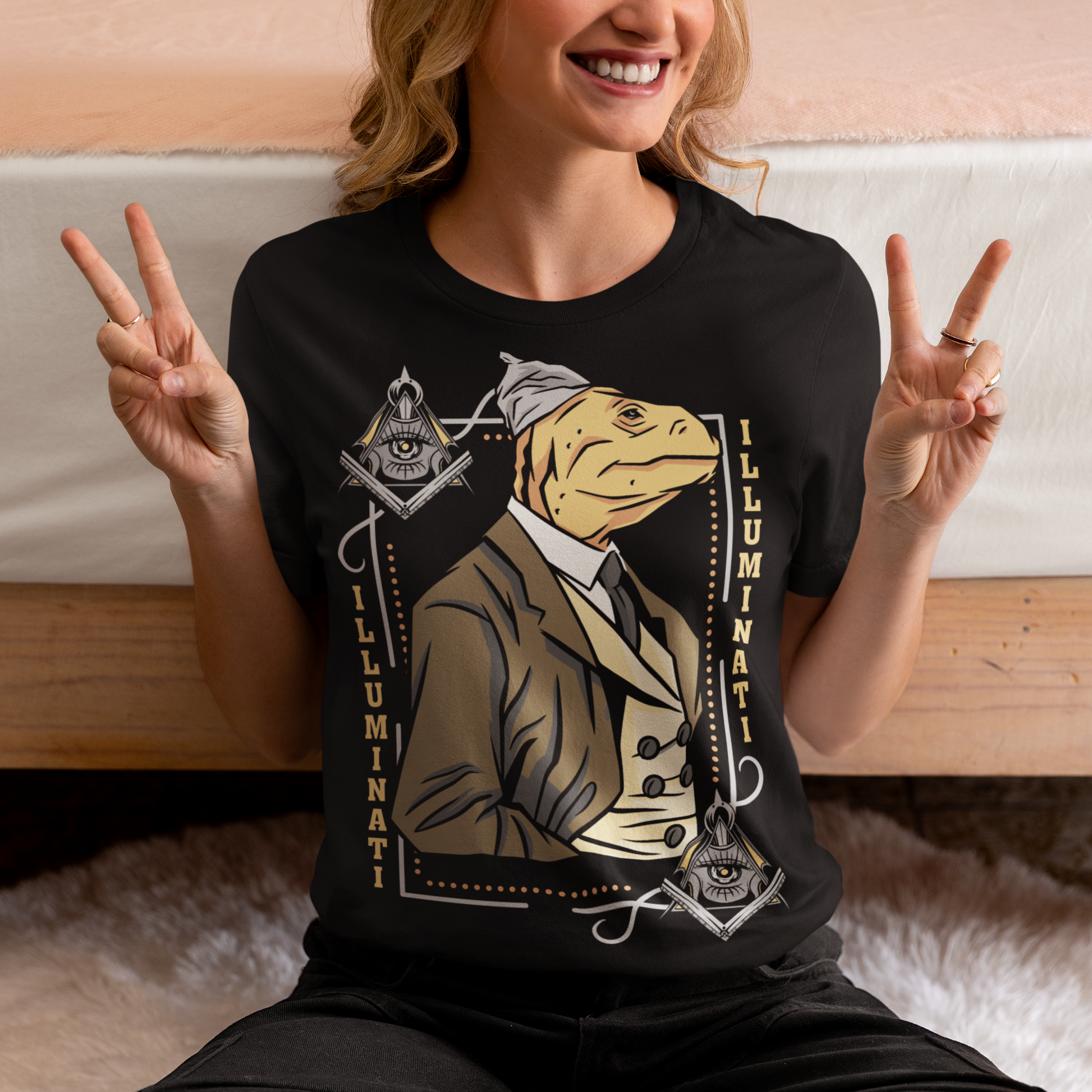Introducing the enigmatic and captivating "Lizard Illuminati" T-shirt, a bold and eccentric garment that seamlessly blends conspiracy theories with reptilian sophistication. This one-of-a-kind tee is not just a piece of clothing; it's a statement, a conversation starter, and a whimsical nod to the mysteries that lurk in the shadows.