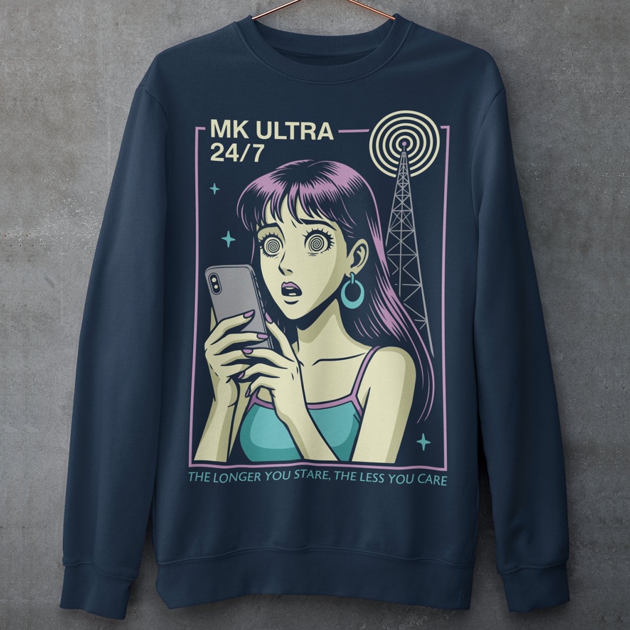 MK Ultra Sweatshirt - Conspiracy Theory Shirt - Mind Control Top - Funny Anime Gift. Step into a hypnotic, retro-futurist vibe with this MK Ultra–inspired sweatshirt, where vintage anime style meets eerie mind-control lore. The design features a wide-eyed character locked into her phone, spiral eyes hinting at digital trance, while a looming signal tower pulses overhead like a silent puppeteer. It’s equal parts nostalgic, unsettling, and irresistibly cool.