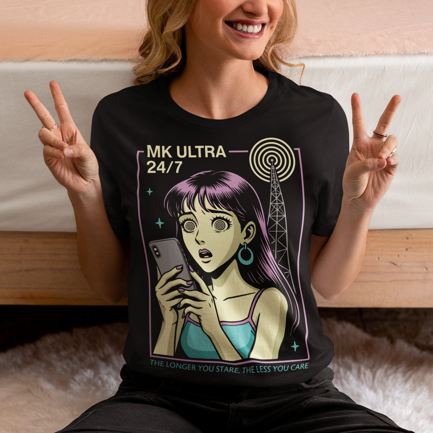 MK Ultra T-Shirt - Conspiracy Theory Shirt - Mind Control Tee - Funny Anime Gift. Step into a hypnotic, retro-futurist vibe with this MK Ultra–inspired t-shirt, where vintage anime style meets eerie mind-control lore. The design features a wide-eyed character locked into her phone, spiral eyes hinting at digital trance, while a looming signal tower pulses overhead like a silent puppeteer. It’s equal parts nostalgic, unsettling, and irresistibly cool.