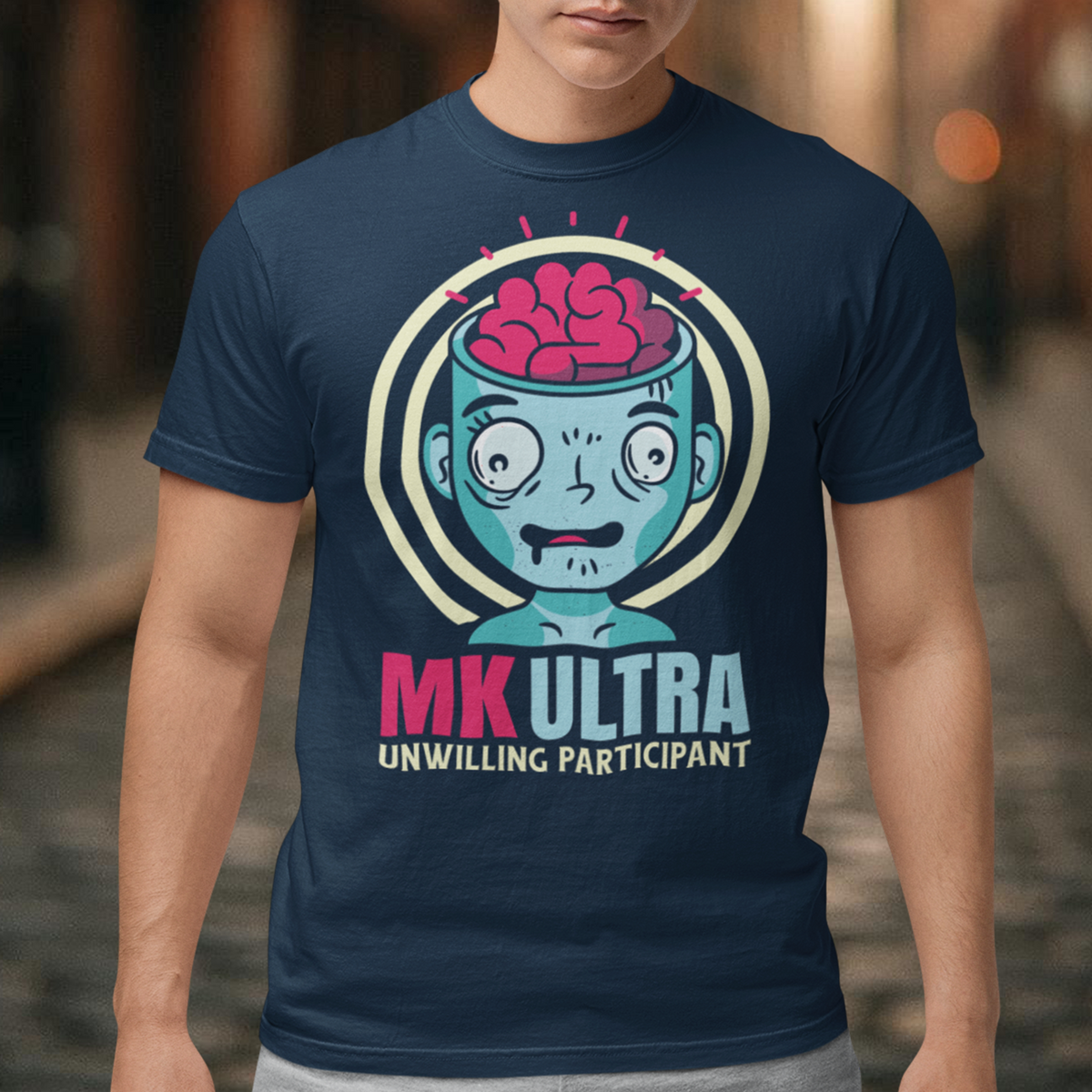 Unveil the enigmatic with our 'MK ULTRA UNWILLING PARTICIPANT' t-shirt! This design boldly features an intriguing graphic of a person with a visible brain, symbolizing the unseen complexities within. Beneath this thought-provoking image lies the impactful message, 'MK ULTRA UNWILLING PARTICIPANT,' a reminder of historical complexities and the exploration of human consciousness.