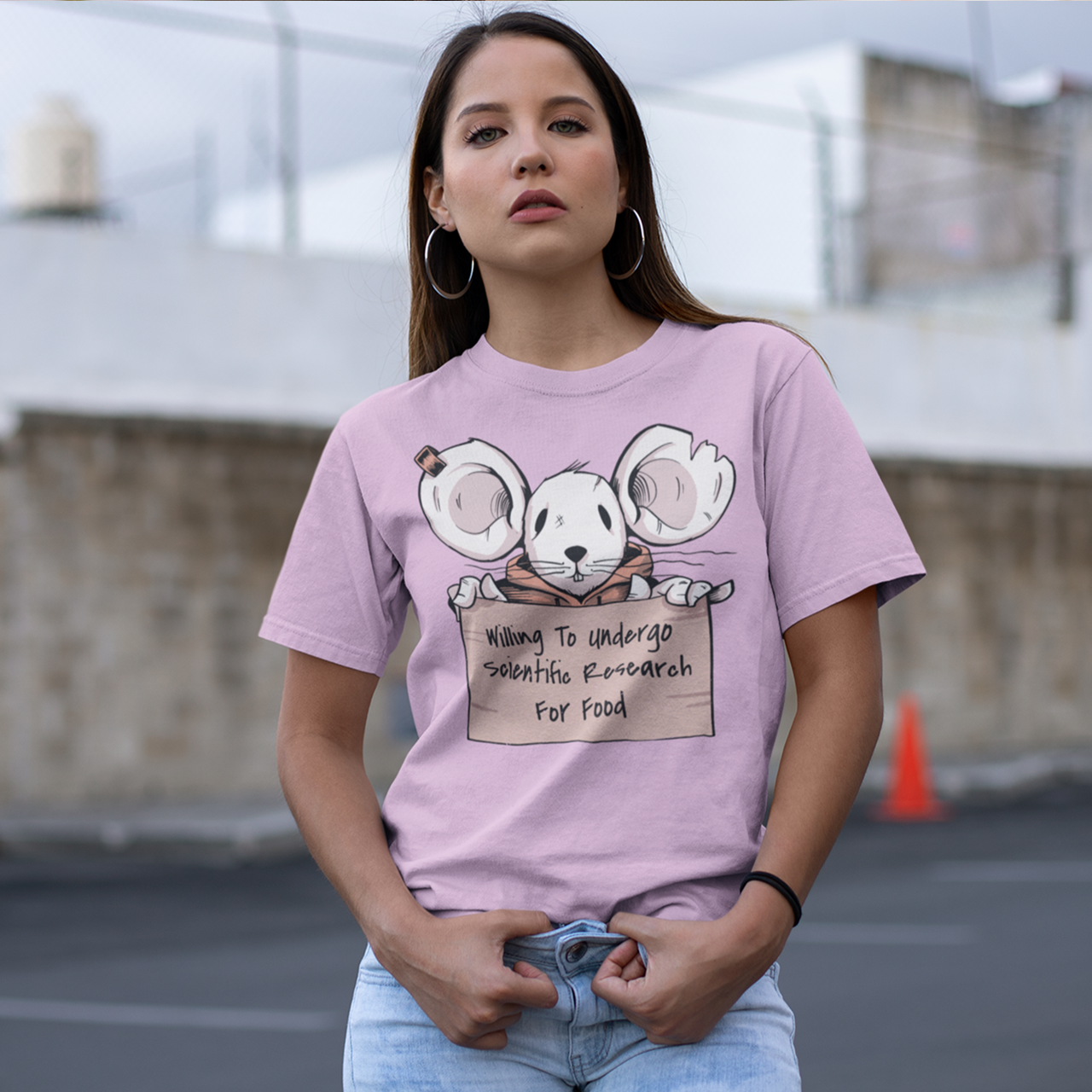 Pink t-shirt with mouse holding a sign. Sign reads "WILLING TO UNDERGO SCIENTIFIC RESEARCH FOR FOOD".