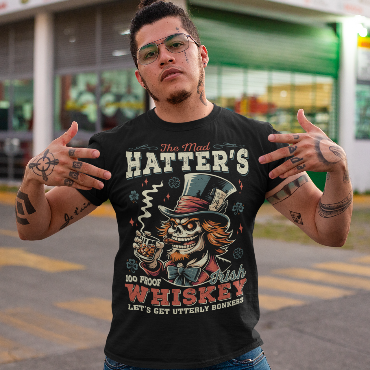 Black t-shirt of the mad hatter with text THE MAD HATTER IRISH WHISKEY.