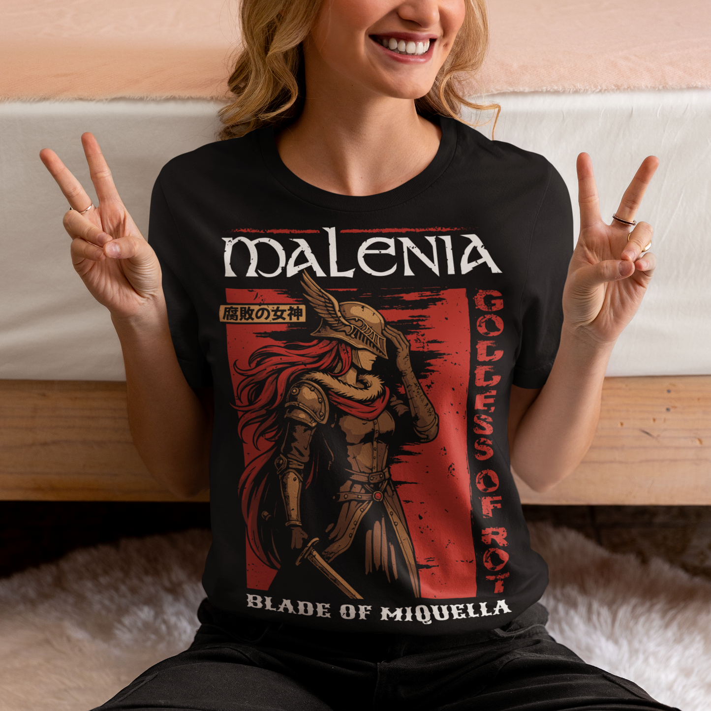 Show your strength and style with this bold Malenia, Goddess of Rot t-shirt. Featuring stunning artwork of the legendary warrior with her iconic red hair and golden armor, this design captures her fierce and elegant power. Perfect for gamers, fantasy lovers, and fans of epic boss battles, this shirt combines dark aesthetic tones with a vintage Japanese poster vibe. A must-have collectible tee for anyone who respects the Blade of Miquella.
