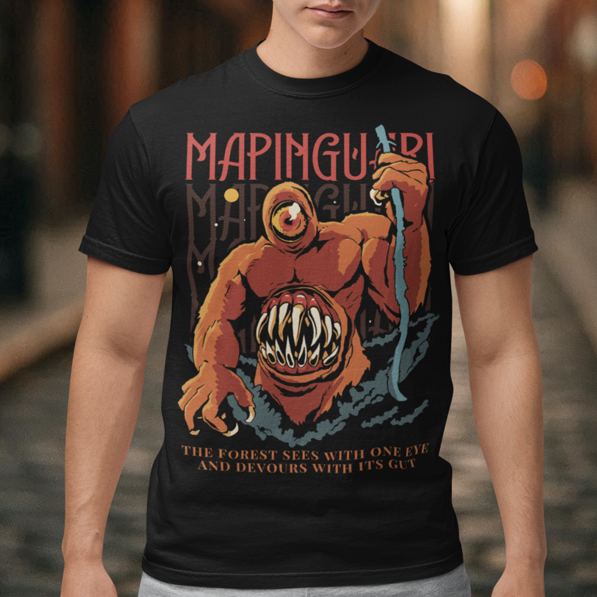 Step into Amazonian legend with this bold Mapinguari tee. Featuring the fearsome cryptid of Brazilian folklore — a towering, shaggy beast with a single glaring eye and a gaping stomach-mouth — this design captures the raw mystery of the rainforest’s most chilling guardian. Perfect for fans of mythology, cryptozoology, or just rocking unique art, this shirt makes a statement wherever you go.