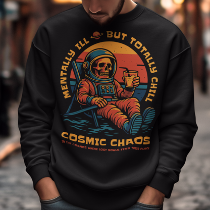 This black graphic sweatshirt features a laid-back skeleton astronaut floating in cosmic calm, drink in hand, as the universe quietly burns behind him. Bold retro colors and sunset tones frame the scene, while the phrase “Mentally Ill But Totally Chill” wraps the design with dark humor and self-aware wit. Anchored by the tagline Cosmic Chaos, it feels like a space-age postcard from the edge of existence.