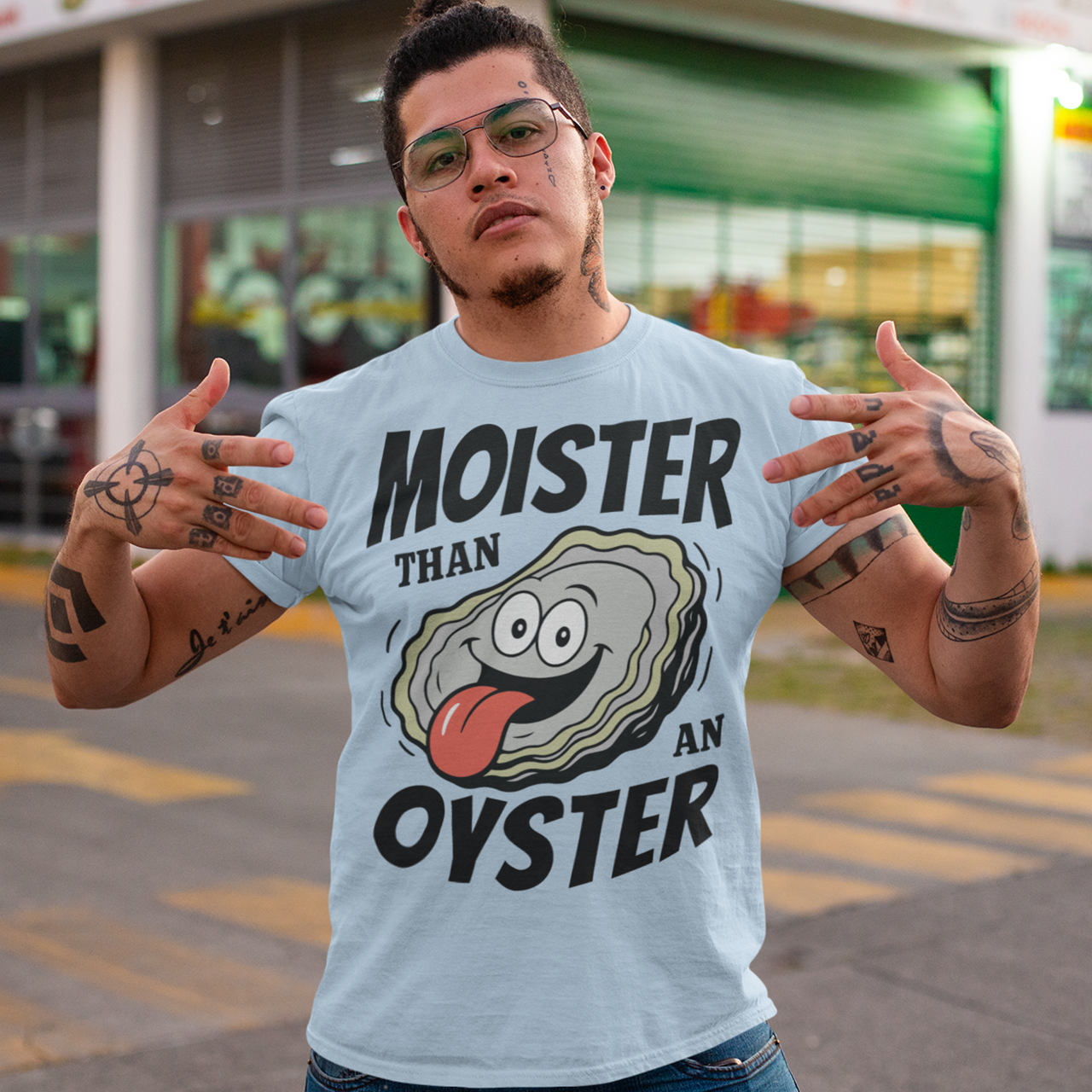 Moister Than An Oyster. This shirt serves up bold humor with a cheeky cartoon oyster grinning ear to ear, tongue out and living its best briny life. The oversized “Moister Than an Oyster” slogan makes zero attempt to be subtle, and that is exactly the point. It is loud, playful, and built for people who enjoy their jokes with a splash of chaos. Perfect for beach trips, bachelorette weekends, seafood lovers, or anyone whose sense of humor lives comfortably in the “did they really just wear that?” category.