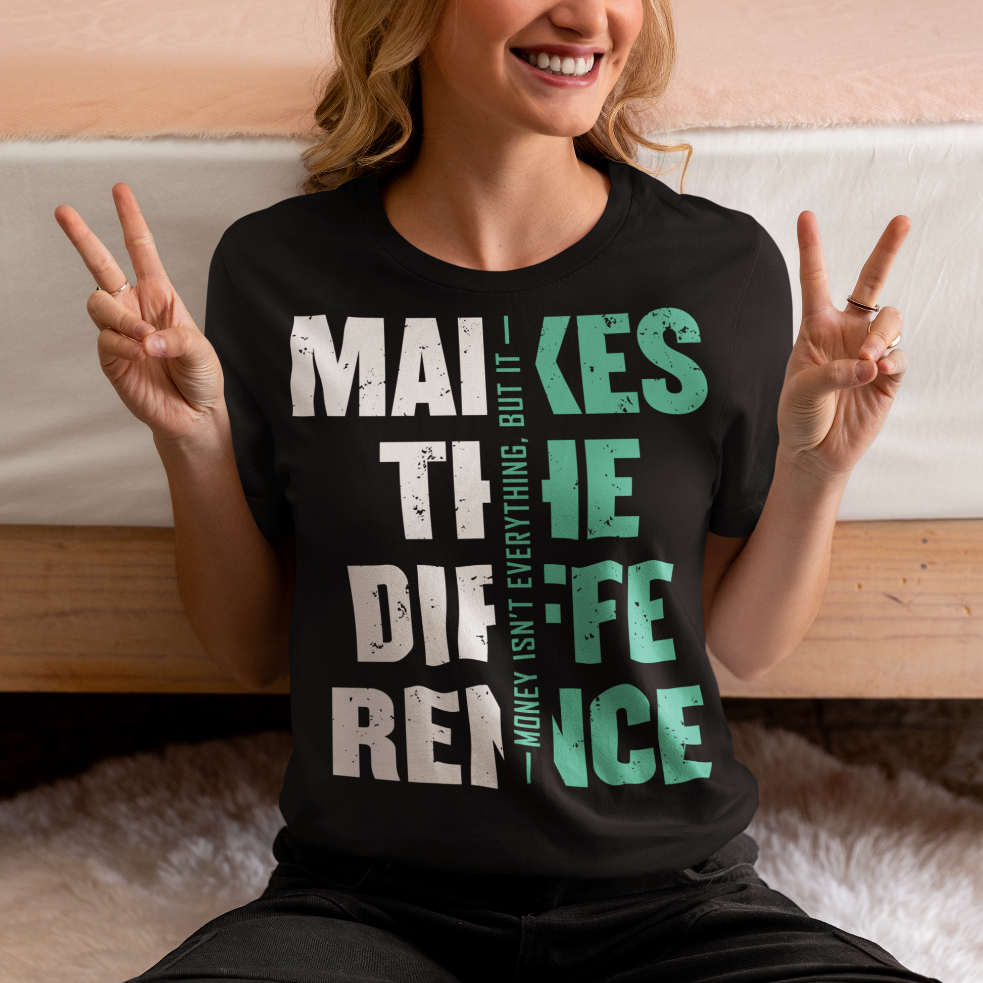 Make a bold statement with this “Money Isn’t Everything, But It Makes the Difference” t-shirt — perfect for hustlers, dreamers, and go-getters who know the value of hard work. Featuring a striking distressed typography design in bold white and teal on a sleek black background, this shirt blends motivation with modern streetwear style. Whether you’re building your empire or just love a powerful quote tee, this shirt keeps your mindset and style on point.