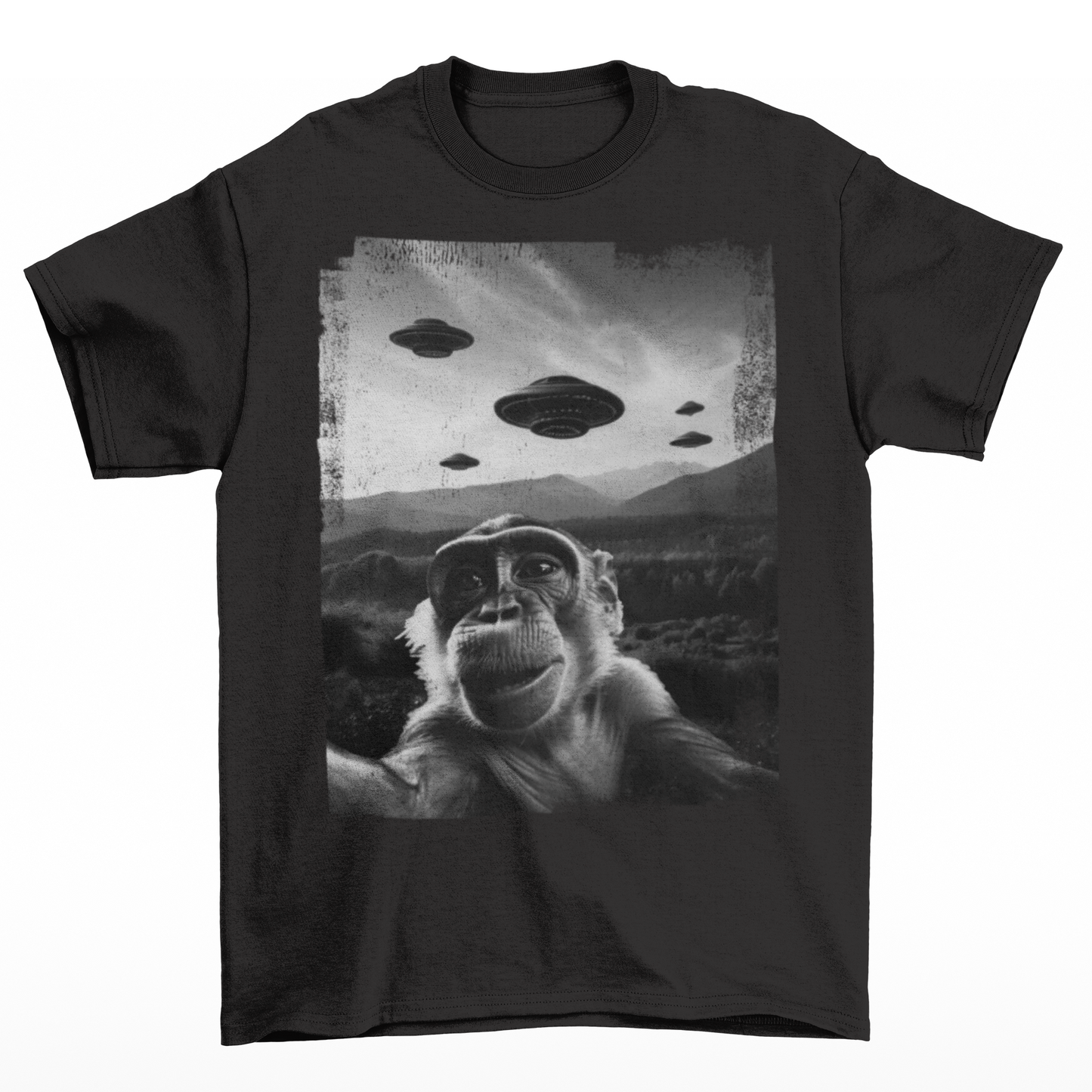 Black t-shirt of a monkey taking a selfie with UFOs in the background.