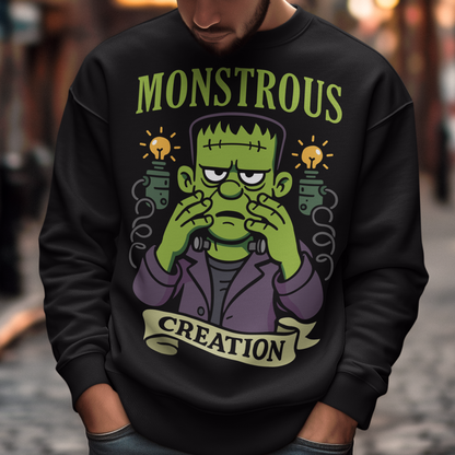 Monstrous creation sweatshirt - Frankenstein shirt. Bring a spark of classic horror to your wardrobe with this bold “Monstrous Creation” sweatshirt. Featuring a grumpy, stitched-up Frankenstein brought to life in a playful cartoon style, this design is a fun tribute to vintage horror with a modern, humorous twist. Surrounded by crackling energy and glowing lab elements, the character captures that iconic “it’s alive!” moment, but with a perfectly unimpressed expression that steals the show.