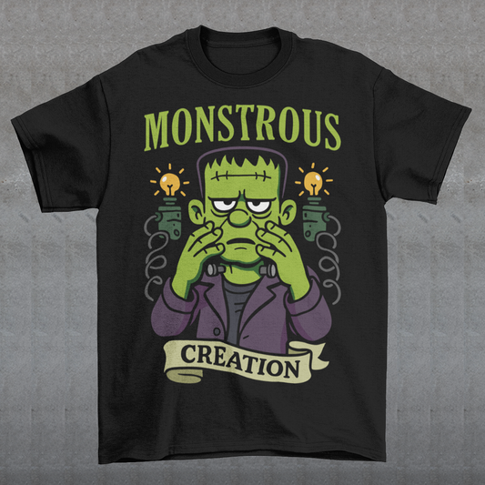 Monstrous creation t-shirt - Frankenstein shirt. Bring a spark of classic horror to your wardrobe with this bold “Monstrous Creation” t-shirt. Featuring a grumpy, stitched-up Frankenstein brought to life in a playful cartoon style, this design is a fun tribute to vintage horror with a modern, humorous twist. Surrounded by crackling energy and glowing lab elements, the character captures that iconic “it’s alive!” moment, but with a perfectly unimpressed expression that steals the show.