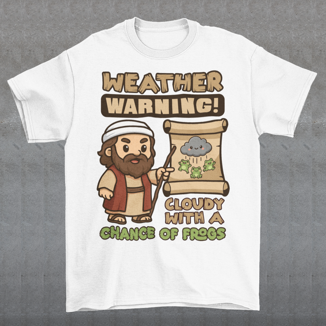 White t-shirt featuring a cute cartoon Moses pointing at a weather scroll that shows a smiling rain cloud and falling frogs. The text reads “Weather Warning! Cloudy With a Chance of Frogs.” The design uses playful retro colors with funny biblical humor inspired by the plague of frogs story