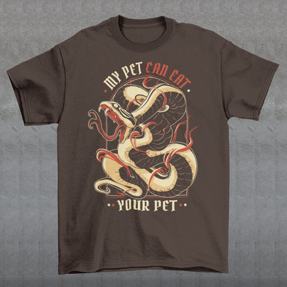 Introducing our edgy and eye-catching t-shirt, where the wild meets the witty: the "MY PET CAN EAT YOUR PET" design. This captivating piece effortlessly combines a striking image of a sinuous and intricately detailed snake with a bold proclamation that's sure to turn heads. At the heart of the design is an incredibly lifelike depiction of a snake, coiled and ready to strike. The artistry and attention to detail showcase every scale, curve, and menacing gaze of this magnificent creature.