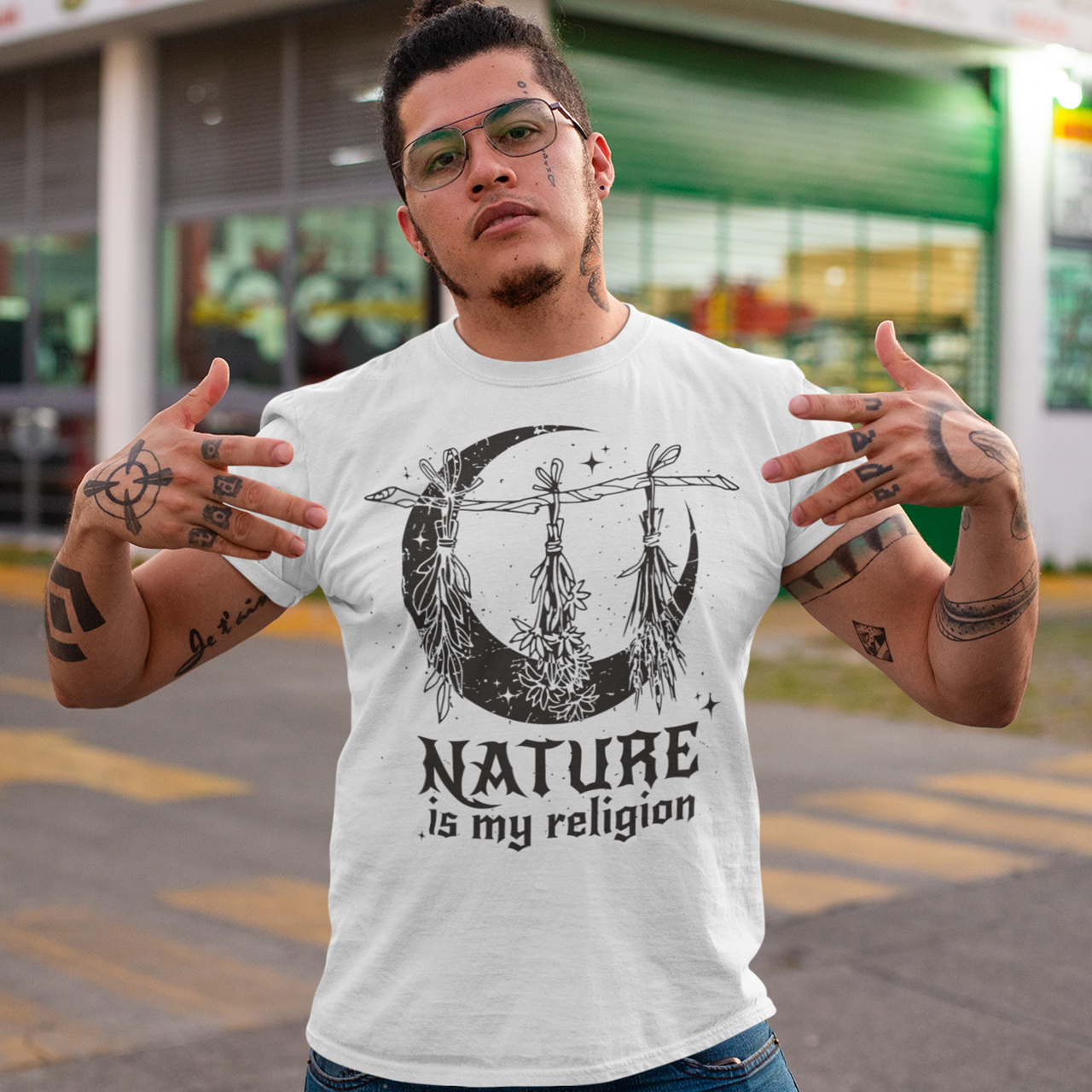 White t-shirt of witch plants and moon with text "NATURE IS MY RELIGION".