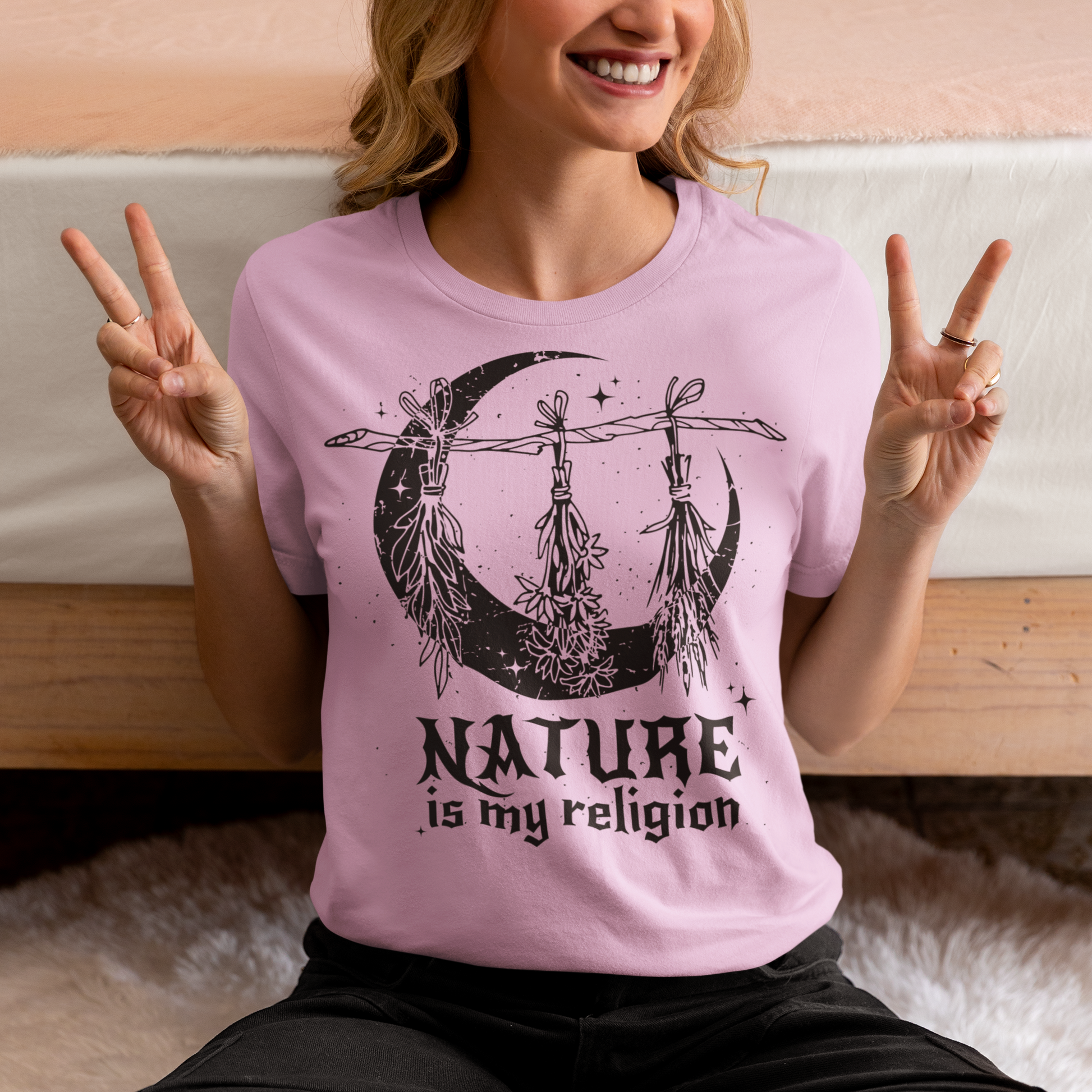 This t-shirt features a stunning and eye-catching design that is sure to grab attention wherever you go. The front of the shirt boldly displays the phrase "Nature is my religion" in bold, striking lettering. The message is a powerful statement that reflects a deep connection and reverence for the natural world. The moon, depicted in intricate detail, adds an extra layer of symbolism to the design.