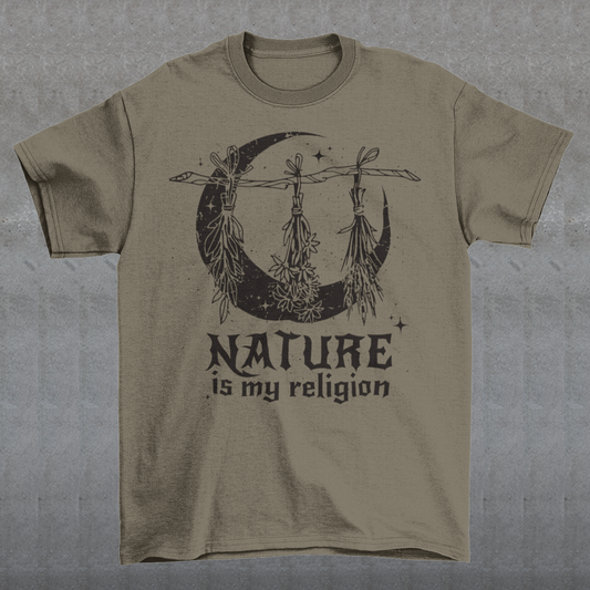 This t-shirt features a stunning and eye-catching design that is sure to grab attention wherever you go. The front of the shirt boldly displays the phrase "Nature is my religion" in bold, striking lettering. The message is a powerful statement that reflects a deep connection and reverence for the natural world. The moon, depicted in intricate detail, adds an extra layer of symbolism to the design.