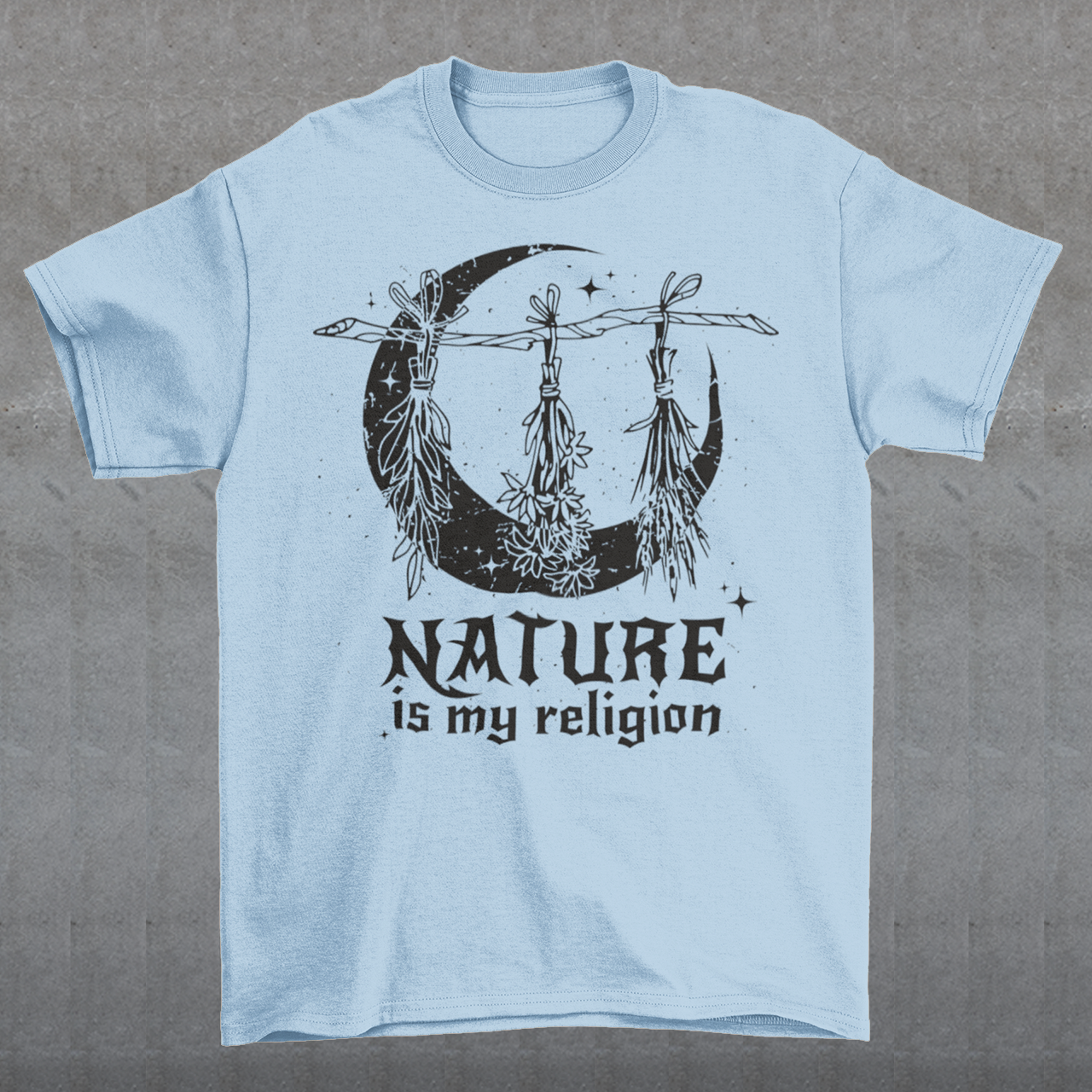 This t-shirt features a stunning and eye-catching design that is sure to grab attention wherever you go. The front of the shirt boldly displays the phrase "Nature is my religion" in bold, striking lettering. The message is a powerful statement that reflects a deep connection and reverence for the natural world. The moon, depicted in intricate detail, adds an extra layer of symbolism to the design.