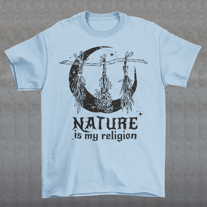 This t-shirt features a stunning and eye-catching design that is sure to grab attention wherever you go. The front of the shirt boldly displays the phrase "Nature is my religion" in bold, striking lettering. The message is a powerful statement that reflects a deep connection and reverence for the natural world. The moon, depicted in intricate detail, adds an extra layer of symbolism to the design.