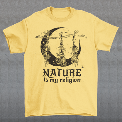 This t-shirt features a stunning and eye-catching design that is sure to grab attention wherever you go. The front of the shirt boldly displays the phrase "Nature is my religion" in bold, striking lettering. The message is a powerful statement that reflects a deep connection and reverence for the natural world. The moon, depicted in intricate detail, adds an extra layer of symbolism to the design.