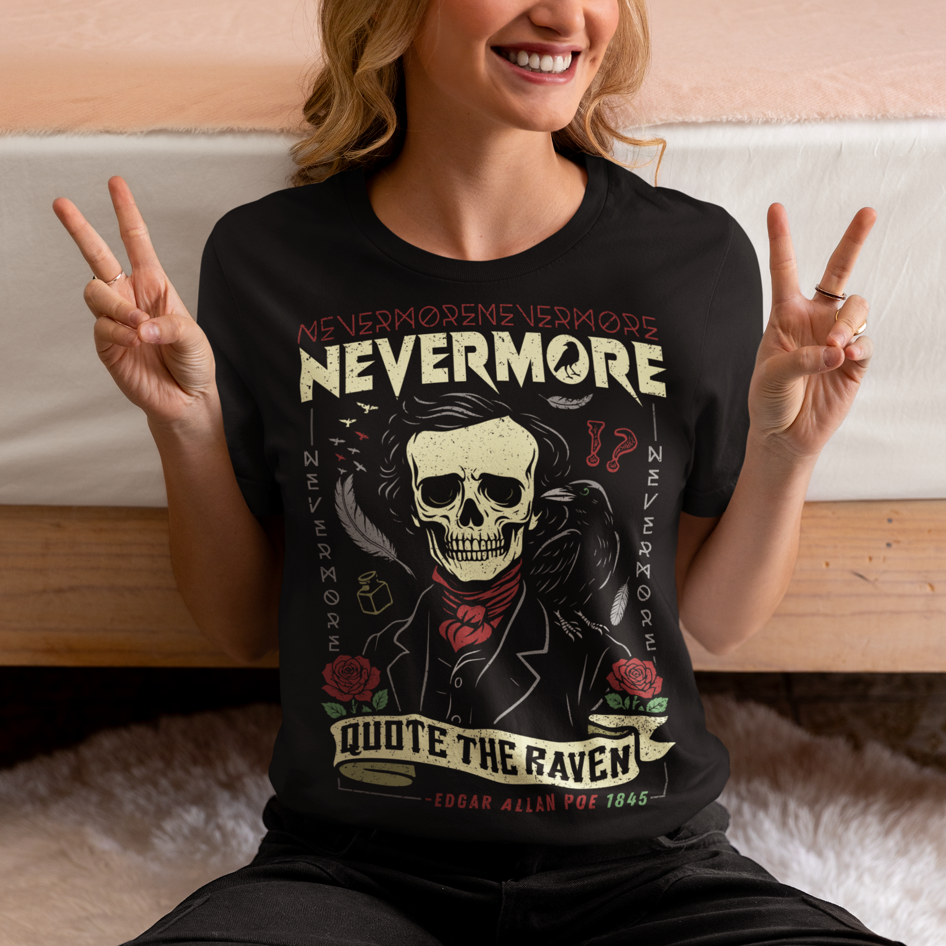 Quote The Raven Nevermore T-Shirt - Edgar Allen Poe Shirt. Step into the haunting world of classic literature with this striking “Nevermore” graphic t-shirt, inspired by the timeless work of Edgar Allan Poe. Featuring a skeletal portrait of the iconic poet alongside a watchful raven, this design captures the eerie essence of The Raven with bold gothic flair. Surrounded by dark symbolism like feathers, ink, and cryptic details, the artwork evokes a sense of mystery, melancholy, and poetic obsession.
