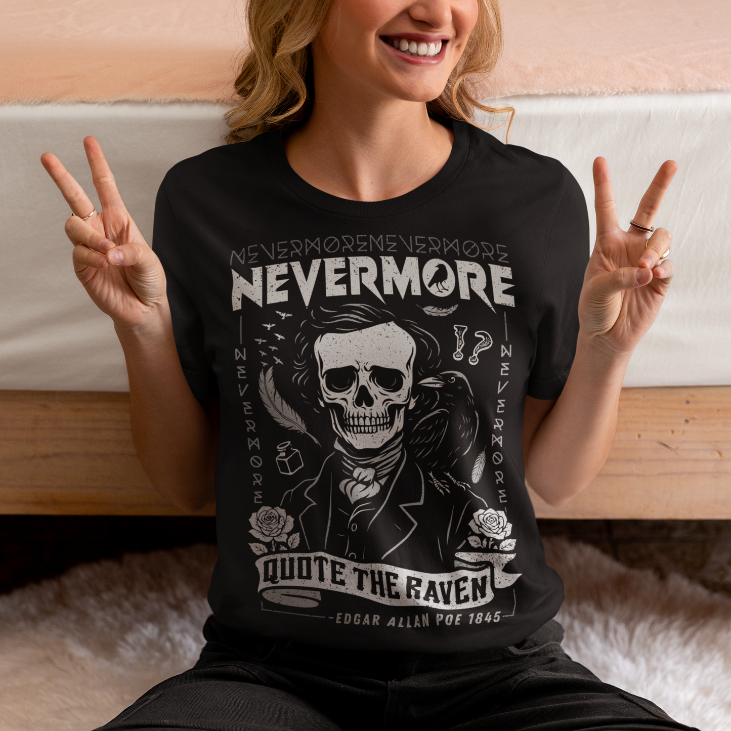Quote The Raven Nevermore T-Shirt - Edgar Allen Poe Shirt. Step into the haunting world of classic literature with this striking “Nevermore” graphic t-shirt, inspired by the timeless work of Edgar Allan Poe. Featuring a skeletal portrait of the iconic poet alongside a watchful raven, this design captures the eerie essence of The Raven with bold gothic flair. Surrounded by dark symbolism like feathers, ink, and cryptic details, the artwork evokes a sense of mystery, melancholy, and poetic obsession.