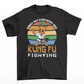 Black t-shirt of a kung fu carrot in front of a retro sun with text around SURELY NOT EVERYBODY WAS KUNG FU FIGHTING.