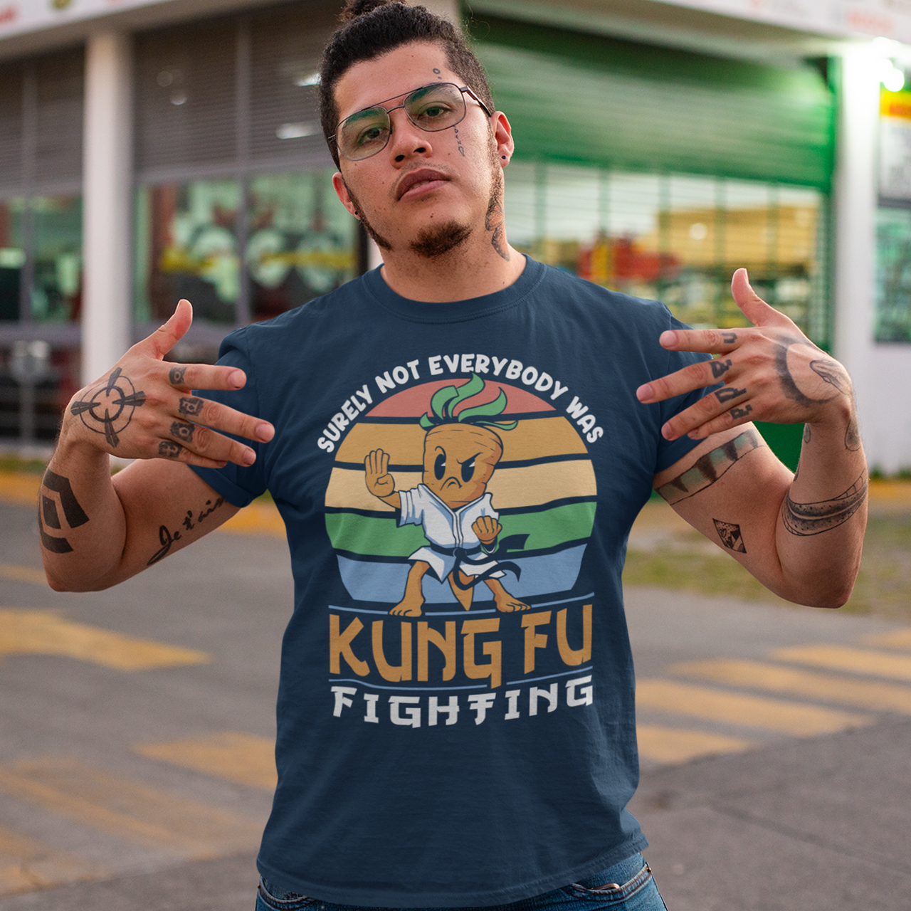 Navy t-shirt of a kung fu carrot in front of a retro sun with text around SURELY NOT EVERYBODY WAS KUNG FU FIGHTING.