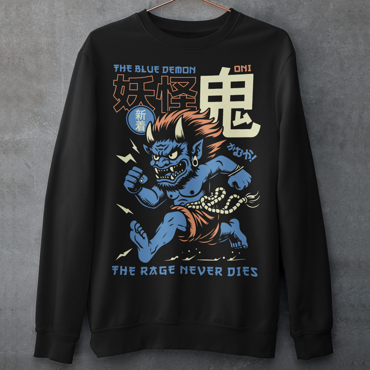 Bold, fierce, and unstoppable — this dynamic sweatshirt features a powerful Japanese Oni mid-sprint, eyes blazing and muscles tense with fury. Above the image, bold text declares "THE PINK DEMON", while below, a chilling reminder reads: "THE RAGE NEVER DIES". This shirt captures the raw energy and mythic wrath of the Oni spirit — perfect for those who embrace intensity and never back down.