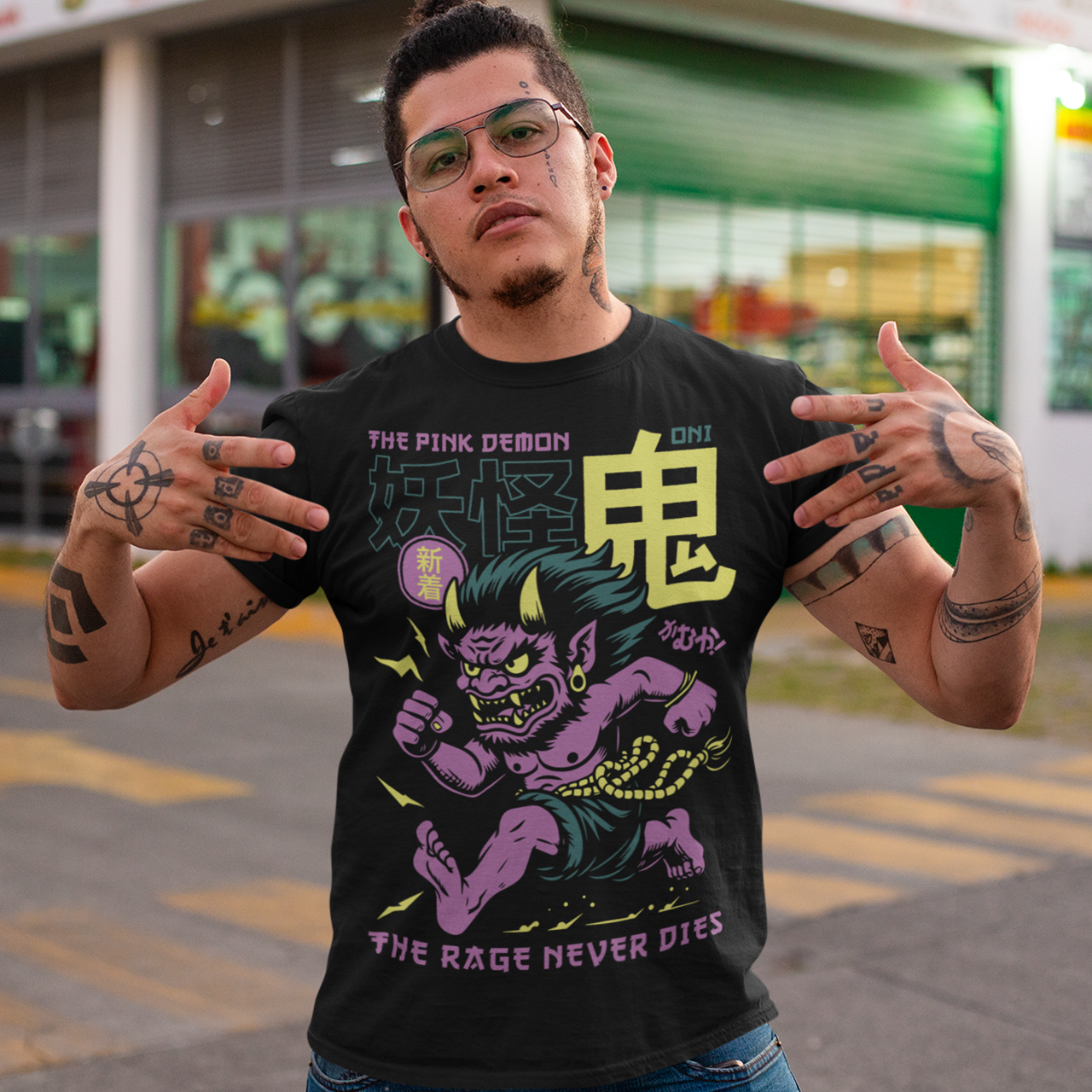 Bold, fierce, and unstoppable — this dynamic tee features a powerful Japanese Oni mid-sprint, eyes blazing and muscles tense with fury. Above the image, bold text declares "THE PINK DEMON", while below, a chilling reminder reads: "THE RAGE NEVER DIES". This shirt captures the raw energy and mythic wrath of the Oni spirit — perfect for those who embrace intensity and never back down.