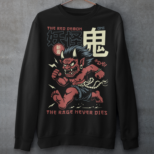 Bold, fierce, and unstoppable — this dynamic sweatshirt features a powerful Japanese Oni mid-sprint, eyes blazing and muscles tense with fury. Above the image, bold text declares "THE RED DEMON", while below, a chilling reminder reads: "THE RAGE NEVER DIES". This shirt captures the raw energy and mythic wrath of the Oni spirit — perfect for those who embrace intensity and never back down.