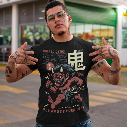 Bold, fierce, and unstoppable — this dynamic tee features a powerful Japanese Oni mid-sprint, eyes blazing and muscles tense with fury. Above the image, bold text declares "THE RED DEMON", while below, a chilling reminder reads: "THE RAGE NEVER DIES". This shirt captures the raw energy and mythic wrath of the Oni spirit — perfect for those who embrace intensity and never back down.