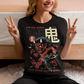 Bold, fierce, and unstoppable — this dynamic tee features a powerful Japanese Oni mid-sprint, eyes blazing and muscles tense with fury. Above the image, bold text declares "THE RED DEMON", while below, a chilling reminder reads: "THE RAGE NEVER DIES". This shirt captures the raw energy and mythic wrath of the Oni spirit — perfect for those who embrace intensity and never back down.