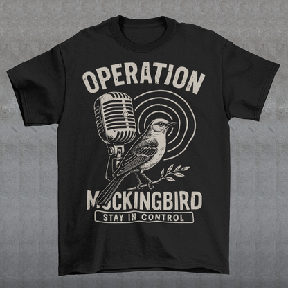 Celebrate a fascinating piece of Cold War history with this Operation Mockingbird tee. Featuring a sleek graphic of a mockingbird perched on a microphone, the design nods to the program that sought to influence news media during the mid-20th century. Perfect for history enthusiasts, political science buffs, and anyone who loves thought-provoking apparel.