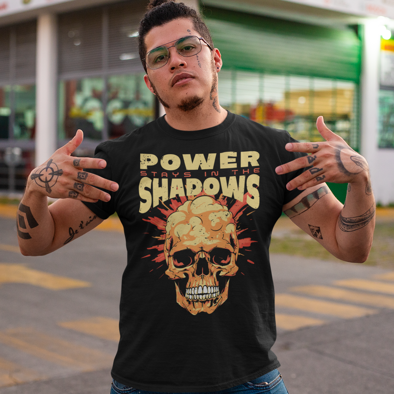 Black t-shirt of a skull atomic bomb with J.R. OPPENHEIMER quote "POWER STAYS IN THE SHADOWS".