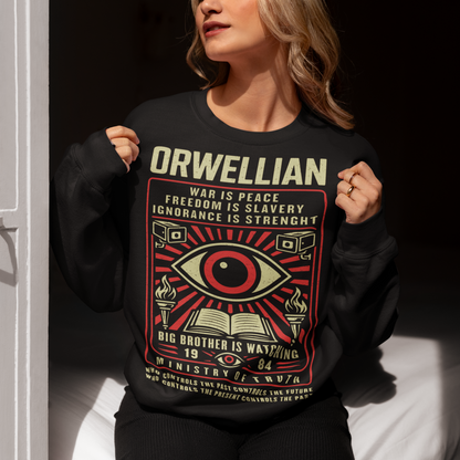 This black Sweatshirt channels the unsettling spirit of George Orwell’s 1984 with bold, high-contrast artwork and iconic slogans that refuse to whisper. The all-seeing eye dominates the design, flanked by surveillance cameras, burning torches, and an open book, a visual chorus of control, truth, and resistance. Phrases like “War Is Peace,” “Freedom Is Slavery,” and “Ignorance Is Strength” sit beneath the unmistakable warning: Big Brother Is Watching.