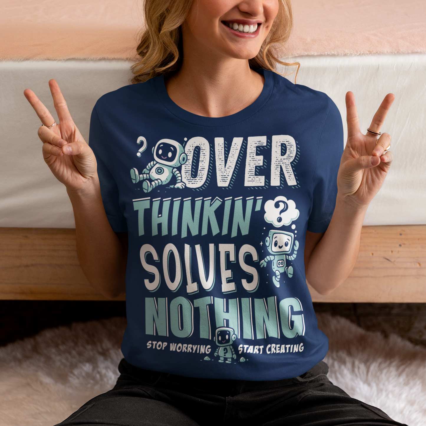 Break the cycle of overthinking in style with this uplifting graphic tee featuring adorable retro robots and the bold message: “Over Thinkin’ Solves Nothing — Stop Worrying, Start Creating.” This design blends playful charm with a motivating reminder to take action instead of stressing. Perfect for artists, students, creators, or anyone who needs a boost of encouragement, this tee makes a thoughtful gift and a daily wearable mantra.