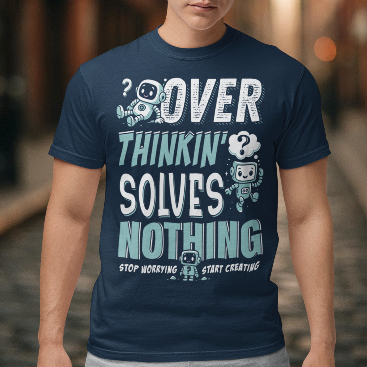 Break the cycle of overthinking in style with this uplifting graphic tee featuring adorable retro robots and the bold message: “Over Thinkin’ Solves Nothing — Stop Worrying, Start Creating.” This design blends playful charm with a motivating reminder to take action instead of stressing. Perfect for artists, students, creators, or anyone who needs a boost of encouragement, this tee makes a thoughtful gift and a daily wearable mantra.