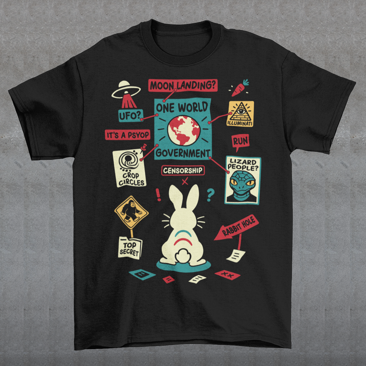 Black t-shirt featuring a humorous conspiracy theory design with a confused rabbit standing before a bulletin board connected by red strings. The artwork includes UFOs, moon landing, lizard people, crop circles, Bigfoot, Illuminati, censorship, psyops, and rabbit hole references in a colorful retro style. A funny graphic tee for fans of conspiracies, cryptids, aliens, internet memes, and mystery-themed humor.