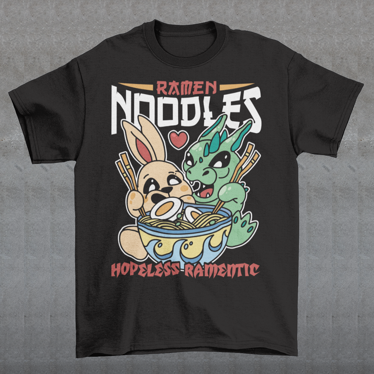 Indulge in the whimsical harmony of culinary delight and fantastical companionship with our "Ramen Noodles" t-shirt featuring a captivating scene of a dragon and a rabbit sharing a bowl of savory ramen. This unique and charming design seamlessly blends the worlds of mythical creatures and culinary passion to create a wearable work of art. Above the delightful duo, the bold text proudly declares "RAMEN NOODLES," setting the stage for the central theme of this captivating tee.