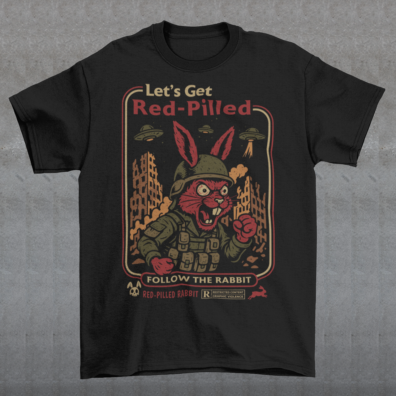 This black graphic tee dives headfirst down the rabbit hole. Featuring a fierce, red-eyed rabbit geared up like a rebel soldier, the design blends sci-fi paranoia, retro poster aesthetics, and counterculture attitude. Bold lettering reads “Let’s Get Red-Pilled” with “Follow the Rabbit” anchoring the scene, while crumbling cityscapes and hovering UFOs set a dystopian, mind-bending mood. This shirt feels like a lost propaganda poster from an alternate reality.