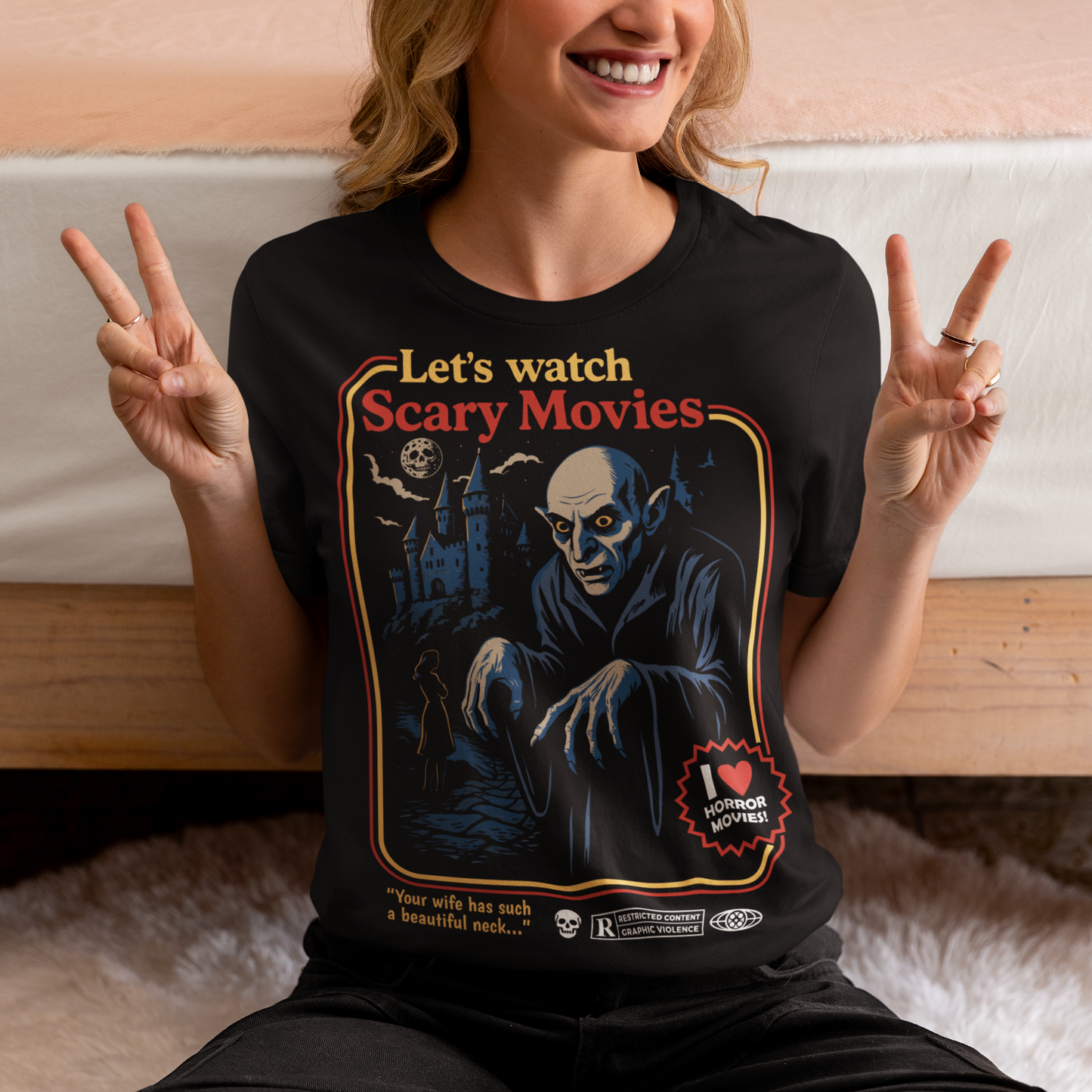 Stay warm with a touch of vintage terror in this Nosferatu-inspired horror shirt. Designed in a retro poster style, it features a classic vampire creeping through a moonlit scene, complete with bold colors, distressed detailing, and nostalgic typography that captures the eerie charm of early silent-film monsters. This shirt is a must-have for horror lovers, gothic aesthetics fans, and anyone who appreciates timeless spooky cinema.
