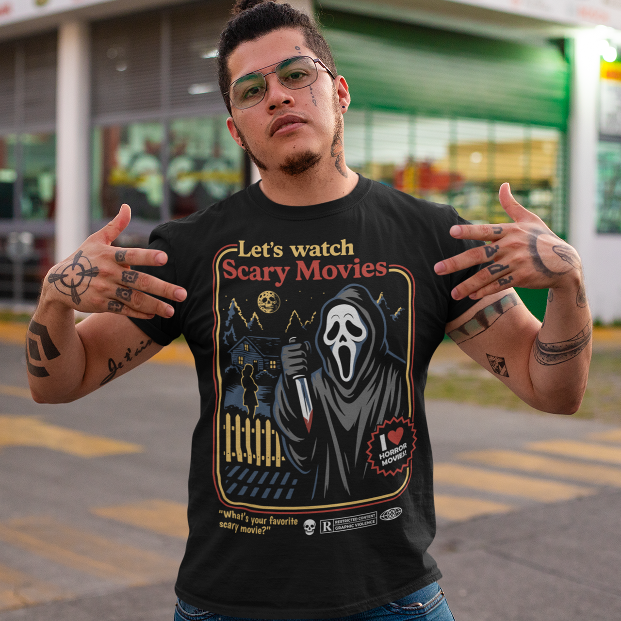 Turn up the terror with this retro-style horror T-shirt featuring a classic masked slasher in a nostalgic vintage poster layout. Bold colors, distressed details, and a nighttime suburban scene create the perfect blend of eerie and playful, ideal for fans of scary movies and old-school horror aesthetics. Whether you’re gearing up for movie marathons, Halloween events, or just showing off your love for spooky culture, this graphic tee makes a killer addition to any horror fan’s wardrobe.