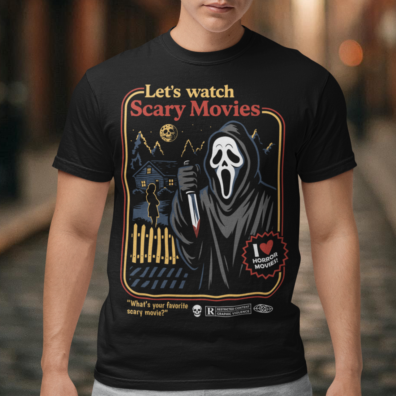 Turn up the terror with this retro-style horror T-shirt featuring a classic masked slasher in a nostalgic vintage poster layout. Bold colors, distressed details, and a nighttime suburban scene create the perfect blend of eerie and playful, ideal for fans of scary movies and old-school horror aesthetics. Whether you’re gearing up for movie marathons, Halloween events, or just showing off your love for spooky culture, this graphic tee makes a killer addition to any horror fan’s wardrobe.