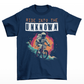 Navy t-shirt of an astronaut riding a bike is space and text above "RIDE INTO THE UNKNOWN".