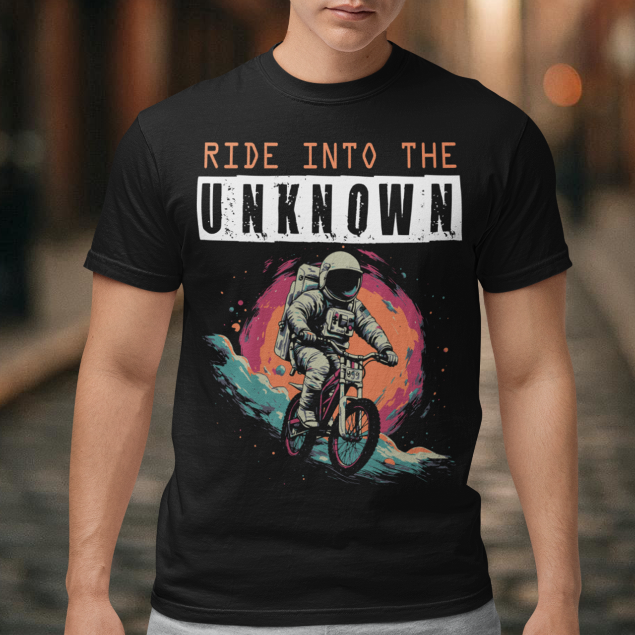 Embark on an intergalactic adventure with this captivating t-shirt featuring a fearless astronaut pedaling through the cosmos on a sleek space bike. Against the backdrop of a star-studded universe, the astronaut, adorned in a spacesuit, navigates the weightlessness of space with an exhilarating sense of exploration.