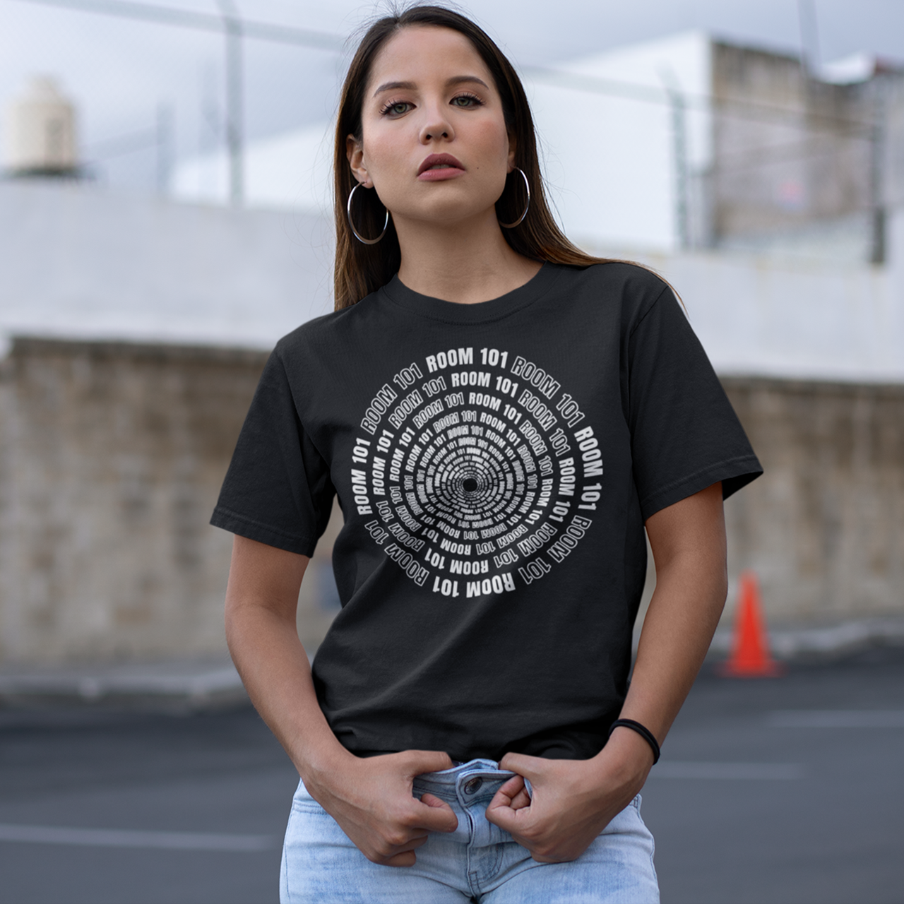 Black t-shirt with room 101 text in a spiral.