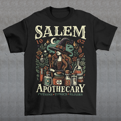 Step into the mystique of Salem with our "Salem Apothecary" t-shirt, a perfect blend of witchy charm and vintage flair. This design features a captivating witch, dressed in traditional attire, brewing potions with an array of mystical bottles and herbs. On the design the words "SALEM APOTHECARY" are prominently displayed, evoking the enchanting atmosphere of an old-world potion shop. This shirt is ideal for those who love the allure of witchcraft and the history of Salem.